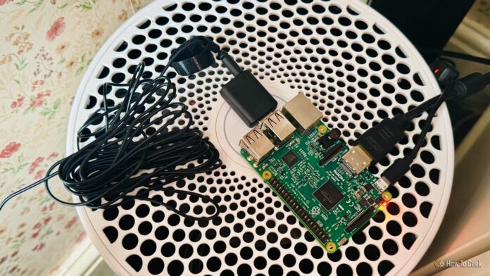 a-raspberry-pi-3b-with-a-usb-mic-with-an-extremely-long-cable-plugged-into-one-of-the-usb-ports Credit: Adam Davidon / How-To Geek