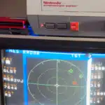 NES Radar Tracks Live Flights at 9600 Baud NES Radar displaying live air traffic data on an NES console setup.