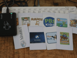 The reader and a set of printed cards, each linked to one title.
