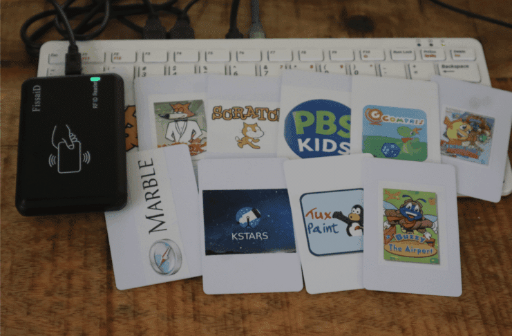 The reader and a set of printed cards, each linked to one title.