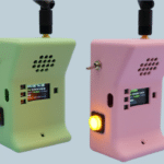 The finished handsets, showing signal strength and “Hold button to talk” on their displays. (Image: Liz Clark / Adafruit)
