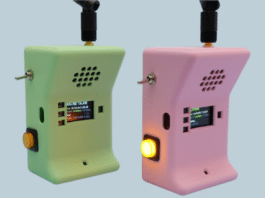 The finished handsets, showing signal strength and “Hold button to talk” on their displays. (Image: Liz Clark / Adafruit)
