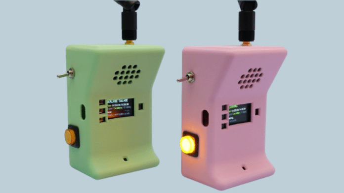 esp32-now-walkie-talkies-adafruit-finished-handsets The finished handsets, showing signal strength and “Hold button to talk” on their displays. (Image: Liz Clark / Adafruit)
