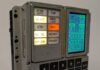 The finished build, with 3D-printed housing and a modern display behind the original panel layout. (Image: Michael Newton)