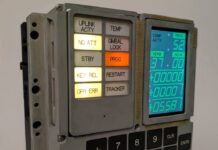 The finished build, with 3D-printed housing and a modern display behind the original panel layout. (Image: Michael Newton)