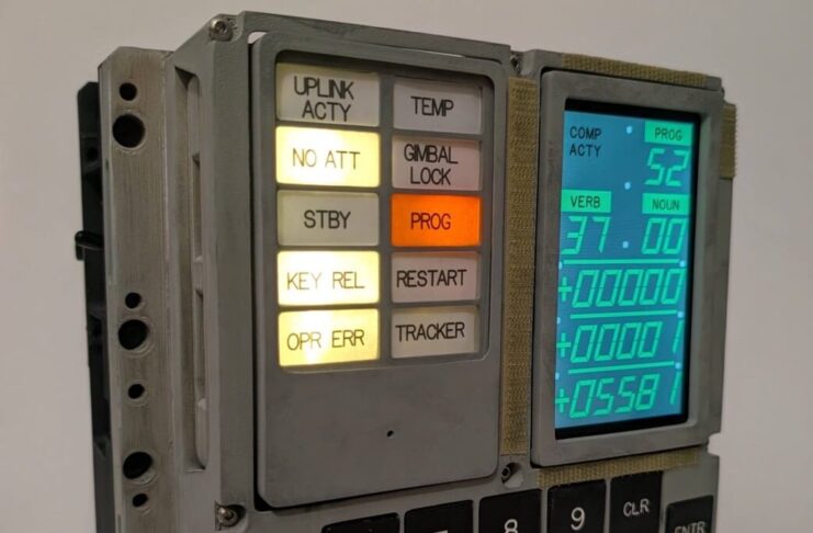 The finished build, with 3D-printed housing and a modern display behind the original panel layout. (Image: Michael Newton)